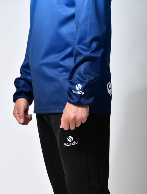 スクアドラ / グラフィックロングスリーブプラクティスシャツ 袖口にはバインダーを付け、よりフィット感をかんじられるようにしています。